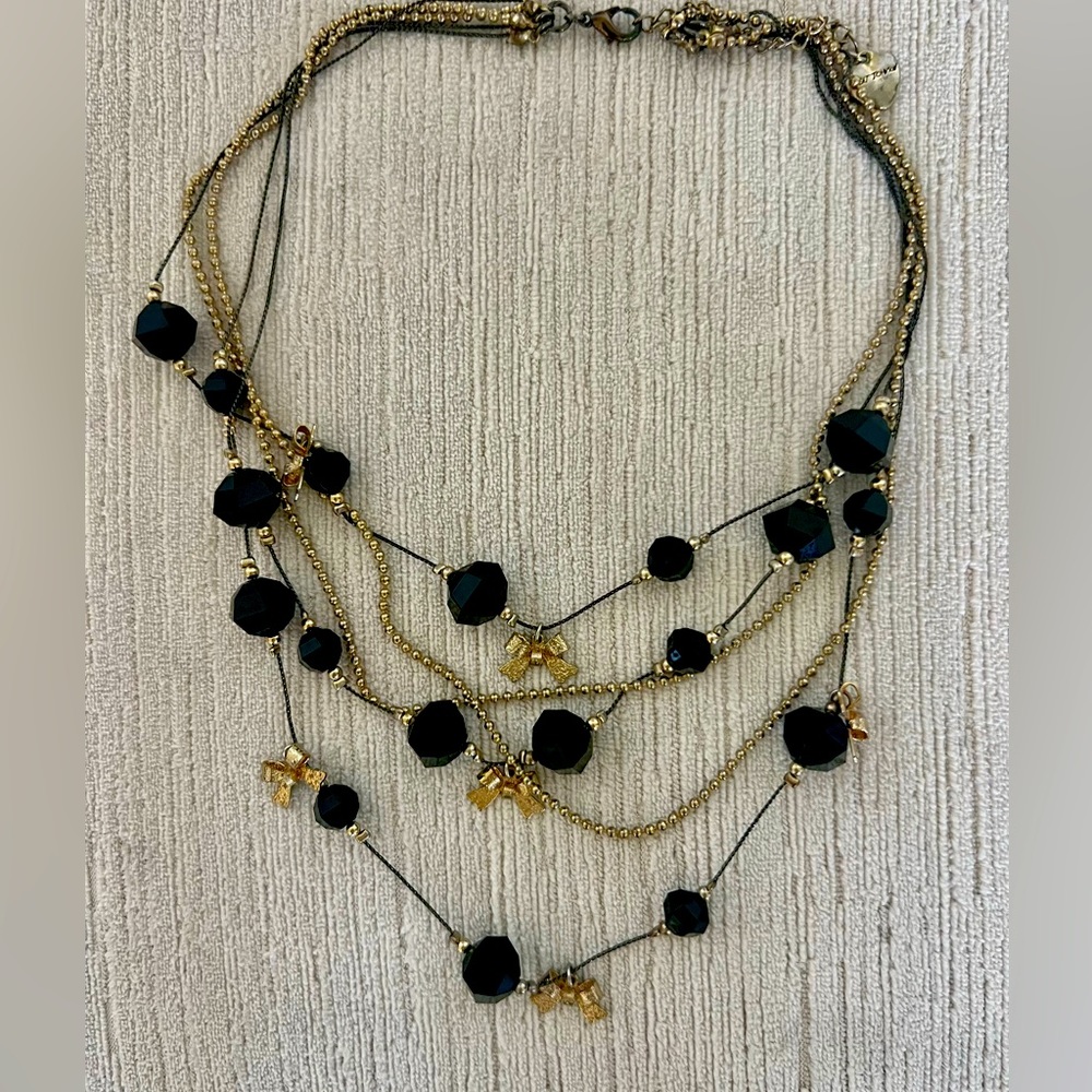 Betsey Johnson multi layer black and gold neckless